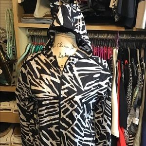 NIKE IMPOSSIBLY LIGHT RUNNING JACKET